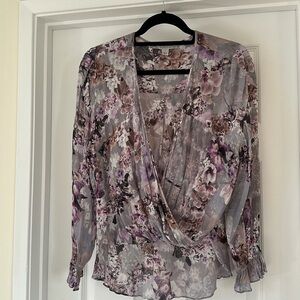 All Saints Aus draped in the front and lower in the back